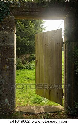 Open gate from walled garden View Large Photo Image Stock Image - Open gate from walled garden. Fotosearch