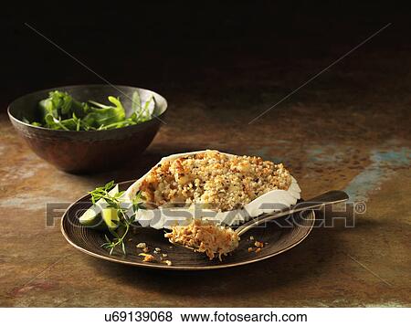 Orkney Crab gratin in shell with rocket and slice lime and thyme garnish View Large Photo Image Stock Photo - Orkney Crab gratin in shell with rocket and slice lime and thyme garnish. Fotosearch