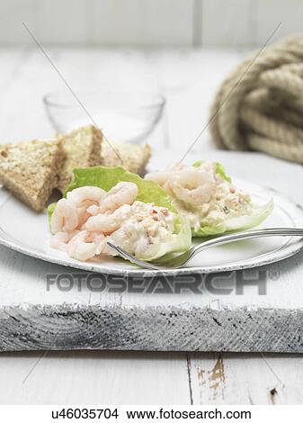 Orkney meat and prawns with slices of bread and lettuce View Large Photo Image Picture - Orkney meat and prawns with slices of bread and lettuce. Fotosearch