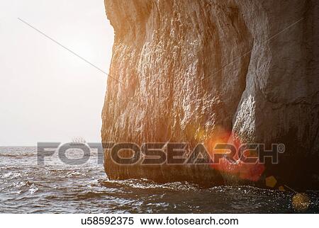 Sea at bottom of cliff, Capri, Napoli, Campania, Italia View Large Photo Image Stock Photography - Sea at bottom of cliff, Capri, Napoli, Campania, Italia. Fotosearch