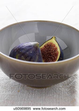 sliced figs in bowl, close-up View Large Photo Image Stock Photography - sliced figs in bowl, close-up. Fotosearch