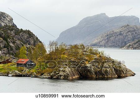 Stock Image - Solitary house, Lysefjord, Rogaland County, Norway. Fotosearch