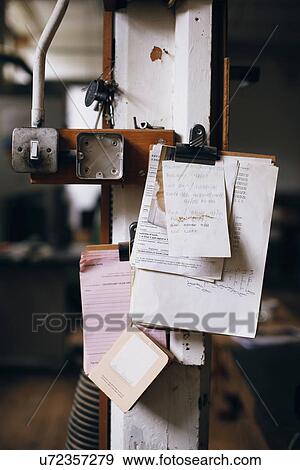 Still life of clipboard and notes on pillar in pipe organ workshop View Large Photo Image Stock Photo - Still life of clipboard and notes on pillar in pipe organ workshop. Fotosearch