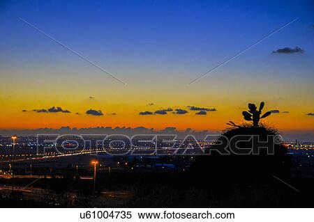 Stock Photography - Sunset over Tel Aviv and Dan region in central Israel. Fotosearch
