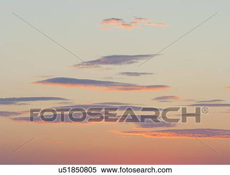 Stock Photography - Sunset twilight clouds sky. Fotosearch