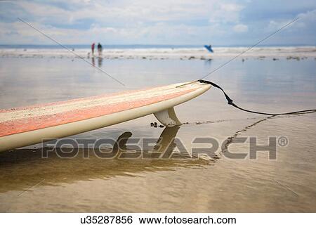 Surfboard on beach View Large Photo Image Stock Photograph - Surfboard on beach. Fotosearch