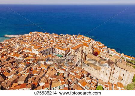 View of coast and town of Cefalu, Sicily, Italy View Large Photo Image Picture - View of coast and town of Cefalu, Sicily, Italy. Fotosearch