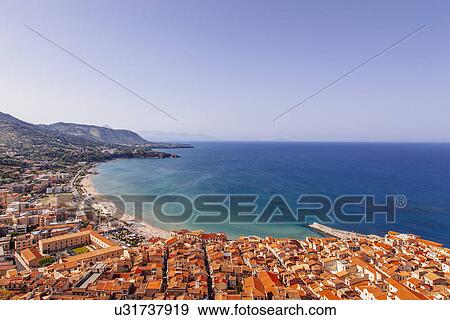 Stock Photo - View of coastline and town of Cefalu, Sicily, Italy. Fotosearch