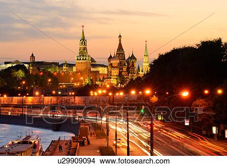 Picture - View of Kremlin towers, Saint Basils Cathedral and city highway at night, Moscow, Russia. Fotosearch