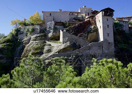 Stock Photograph - View of monastery built on top of rocks, Meteora, Greece. Fotosearch