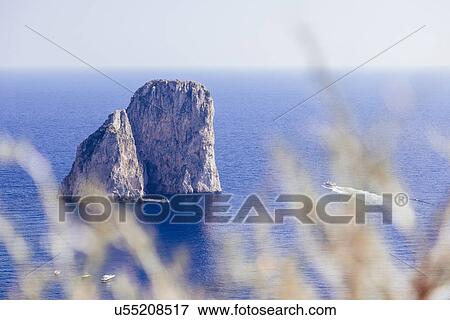 View of sea and rock formations, Capri, Italy View Large Photo Image Stock Photo - View of sea and rock formations, Capri, Italy. Fotosearch