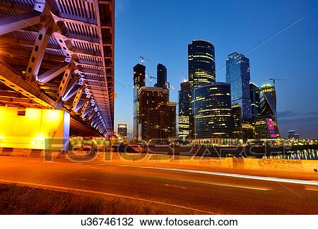 Stock Image - View of skyscrapers and Dorogomilovsky bridge at night, Moscow, Russia. Fotosearch