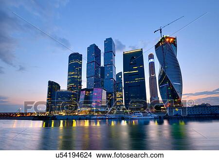 View of skyscrapers on Moskva river at night, Moscow, Russia View Large Photo Image Picture - View of skyscrapers on Moskva river at night, Moscow, Russia. Fotosearch