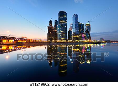 View of skyscrapers on Moskva river waterfront at night, Moscow, Russia View Large Photo Image Stock Image - View of skyscrapers on Moskva river waterfront at night, Moscow, Russia. Fotosearch