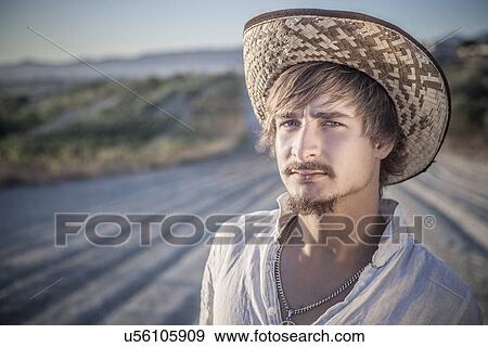 Stock Photo - Viticulturist working in vineyard, Cagliari, Sardinia, Italy. Fotosearch