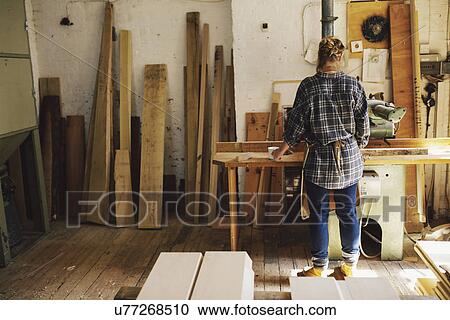 Young craftswoman at workbench in pipe organ workshop View Large Photo Image Stock Image - Young craftswoman at workbench in pipe organ workshop. Fotosearch