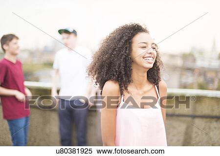 Young woman laughing View Large Photo Image Stock Photography - Young woman laughing. Fotosearch