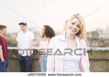 Stock Photo - Young woman smiling. Fotosearch