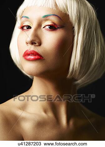 Young woman with blonde bob View Large Photo Image Stock Image - Young woman with blonde bob. Fotosearch