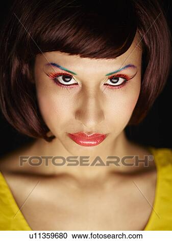 Young woman with brown bob View Large Photo Image Stock Image - Young woman with brown bob. Fotosearch