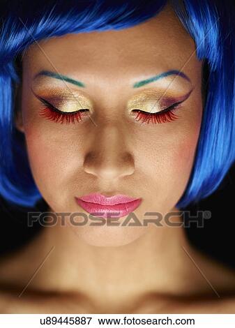 Young woman with dyed blue hair View Large Photo Image Stock Photo - Young woman with dyed blue hair. Fotosearch