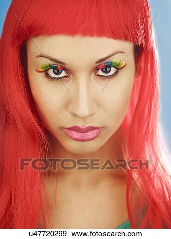 Young woman with dyed red hair View Large Photo Image Stock Photo - Young woman with dyed red hair. Fotosearch