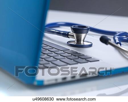Stock Image - Doctor Online. Fotosearch