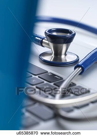 Stock Image - Doctor Online. Fotosearch