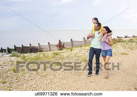 Father giving daughter piggyback View Large Photo Image Stock Photograph - Father giving daughter piggyback. Fotosearch