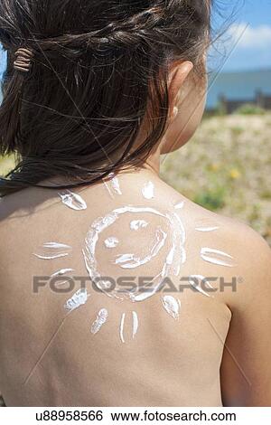 Girl with suncream on back View Large Photo Image Stock Photograph - Girl with suncream on back. Fotosearch