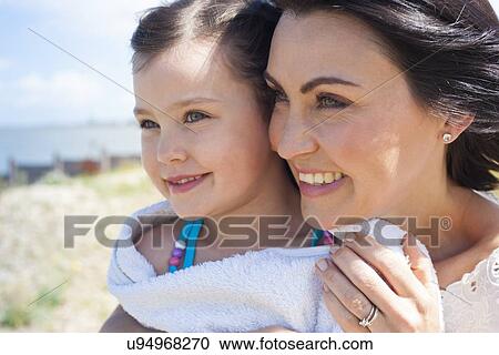 Mother and daughter smiling View Large Photo Image Stock Image - Mother and daughter smiling. Fotosearch