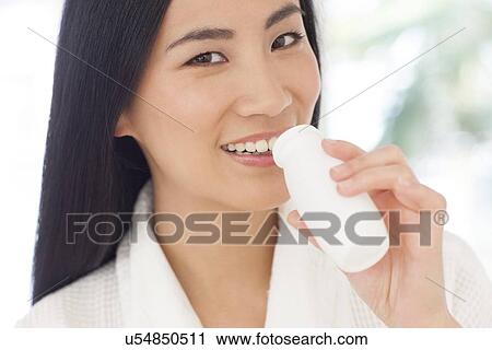 Woman drinking health drink View Large Photo Image Stock Image - Woman drinking health drink. Fotosearch
