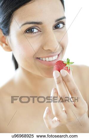Woman holding strawberry View Large Photo Image Stock Photography - Woman holding strawberry. Fotosearch