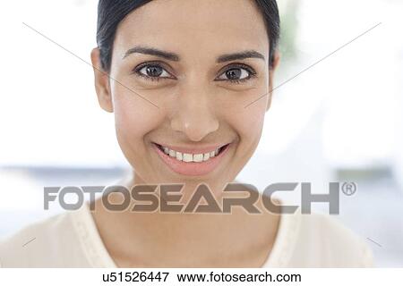 Woman looking at camera View Large Photo Image Stock Photo - Woman looking at camera. Fotosearch