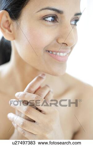 Stock Image - Woman looking away. Fotosearch