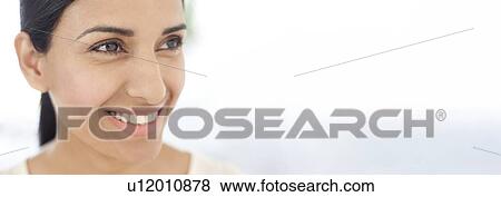 Woman looking away View Large Photo Image Stock Photo - Woman looking away. Fotosearch