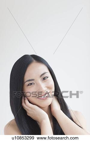 Stock Photo - Woman smiling. Fotosearch