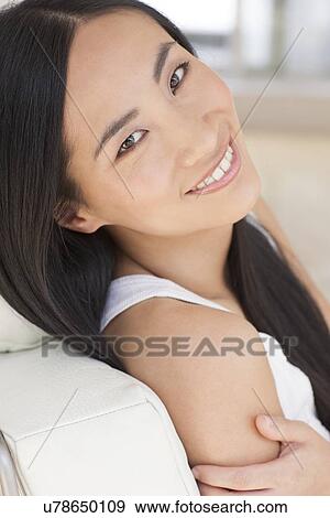Stock Photo - Woman smiling. Fotosearch