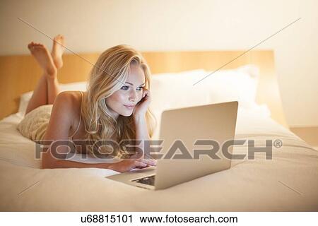 Woman using laptop View Large Photo Image Stock Image - Woman using laptop. Fotosearch