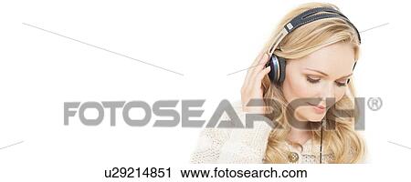 Woman wearing headphones View Large Photo Image Stock Image - Woman wearing headphones. Fotosearch