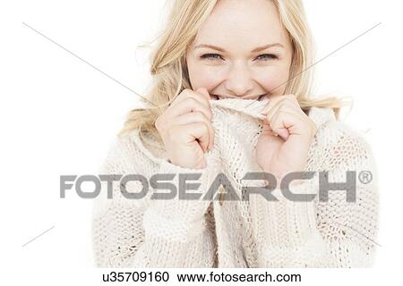 Woman wearing sweater View Large Photo Image Stock Image - Woman wearing sweater. Fotosearch
