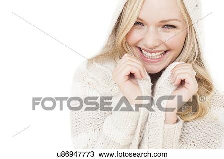 Stock Image - Woman wearing sweater. Fotosearch