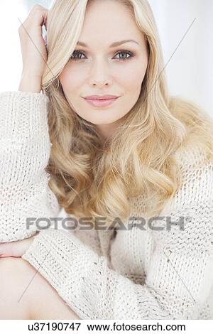 Woman wearing sweater View Large Photo Image Stock Photo - Woman wearing sweater. Fotosearch