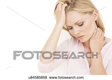 Woman with hand on head View Large Photo Image Stock Photo - Woman with hand on head. Fotosearch