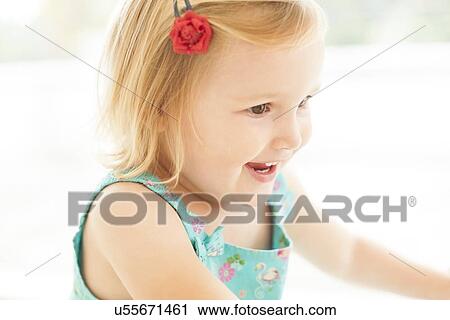 Stock Image - Young girl smiling. Fotosearch