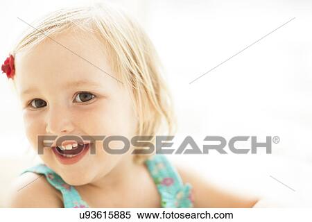 Stock Photography - Young girl smiling. Fotosearch