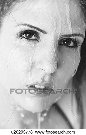 Black and white of a woman with water on her View Large Photo Image Stock Photo - Black and white of a woman with water on her . Fotosearch
