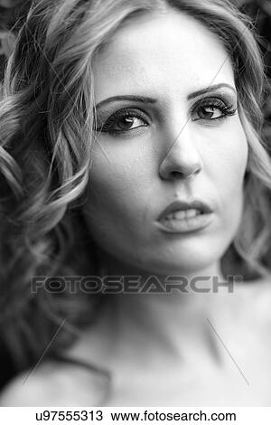 Stock Image - Made up woman . Fotosearch