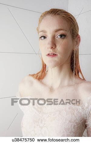 Woman in a shower wearing lace View Large Photo Image Stock Image - Woman in a shower wearing lace. Fotosearch