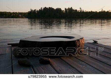 Birdbath on a dock, Lake of The Woods, Ontario, Canada View Large Photo Image Stock Photography - Birdbath on a dock, Lake of The Woods, Ontario, Canada. Fotosearch